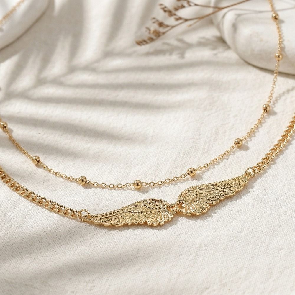 سلسلة خصر أنيقة بتصميم أجنحة م - مراجعة Body Jewelry Charms وسعره