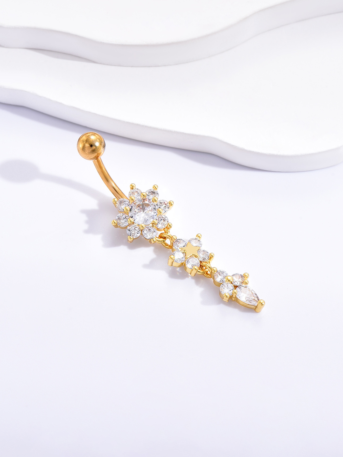 مسمار السرة الطويل المنحني بخط - مراجعة Body Jewelry Europe وسعره