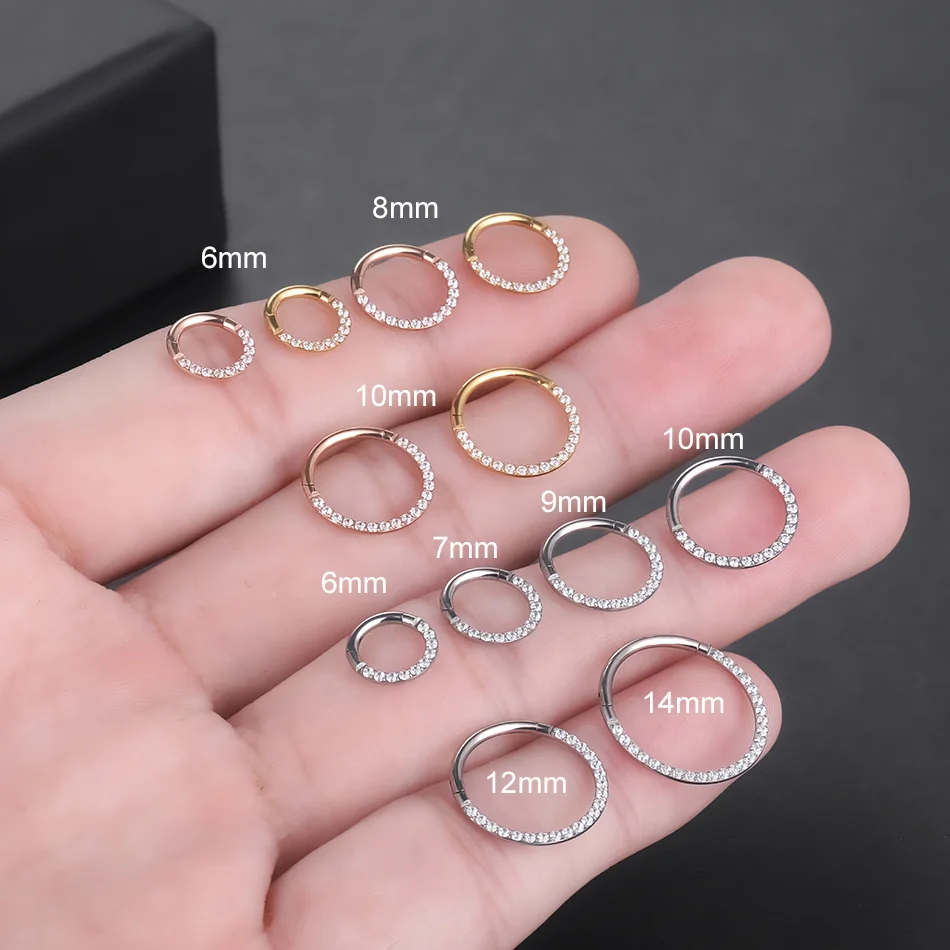 F136 طوق من الخرز المفصلي لثقب - مراجعة Septum Clicker Ring وسعره